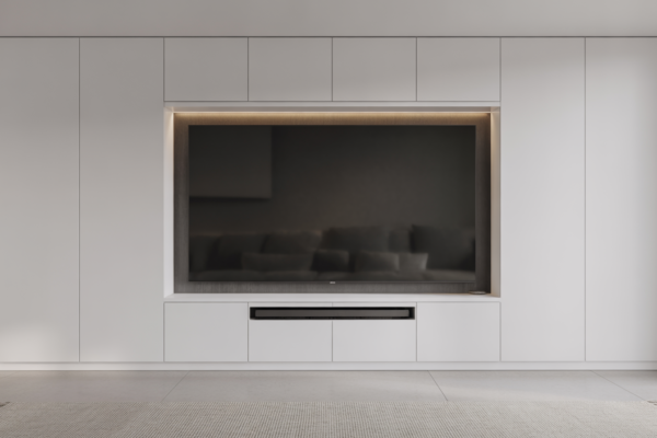 Modern custom media wall with integrated TV, storage cabinets, and LED lighting in a minimalist setting